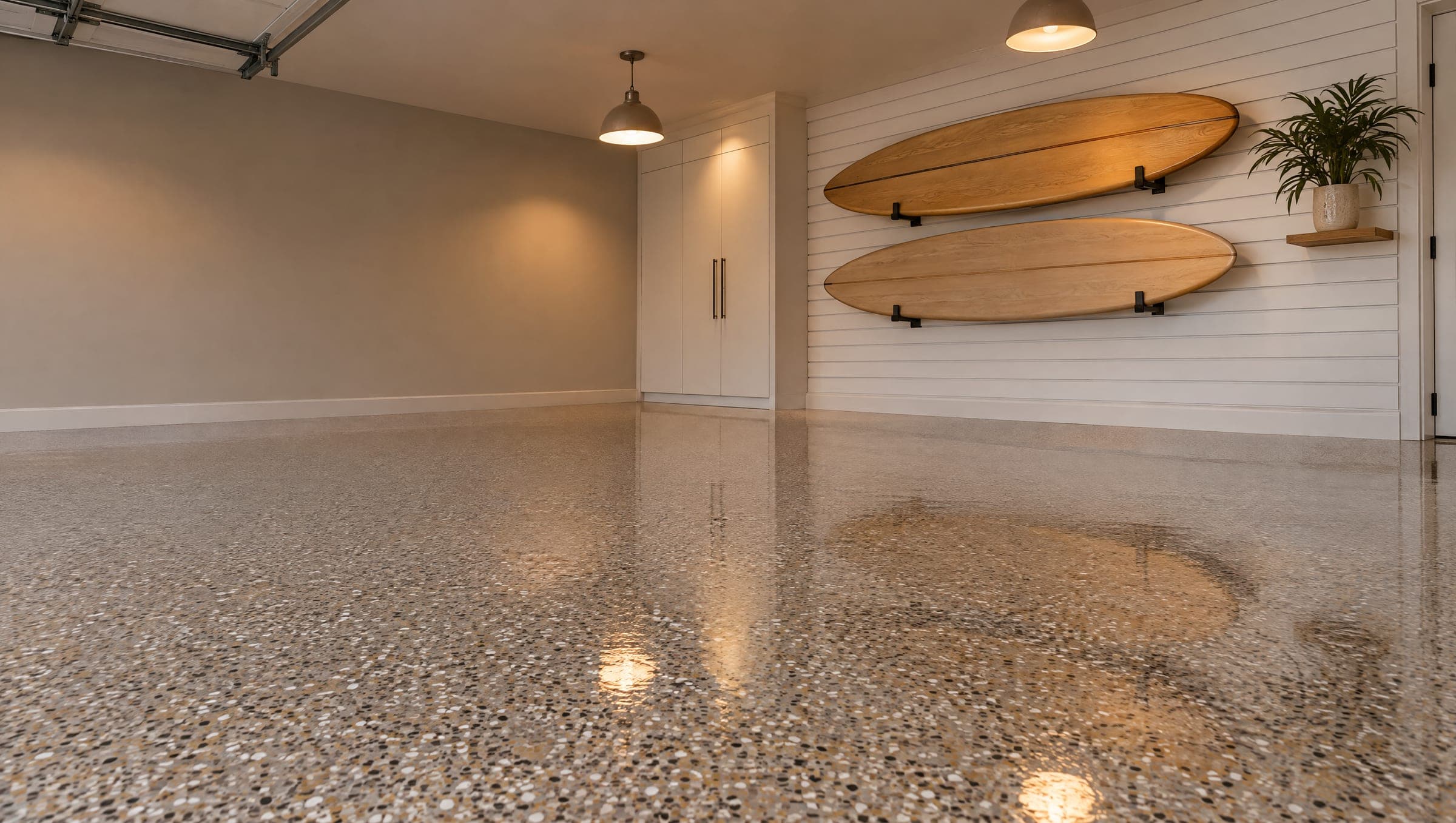Gray flake floor in an open garage with soft coastal daylight